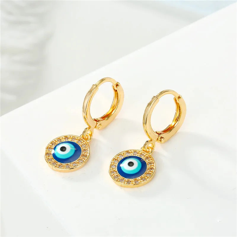 Aretes Ojo Malo Azul con Strass Redondos en Oro