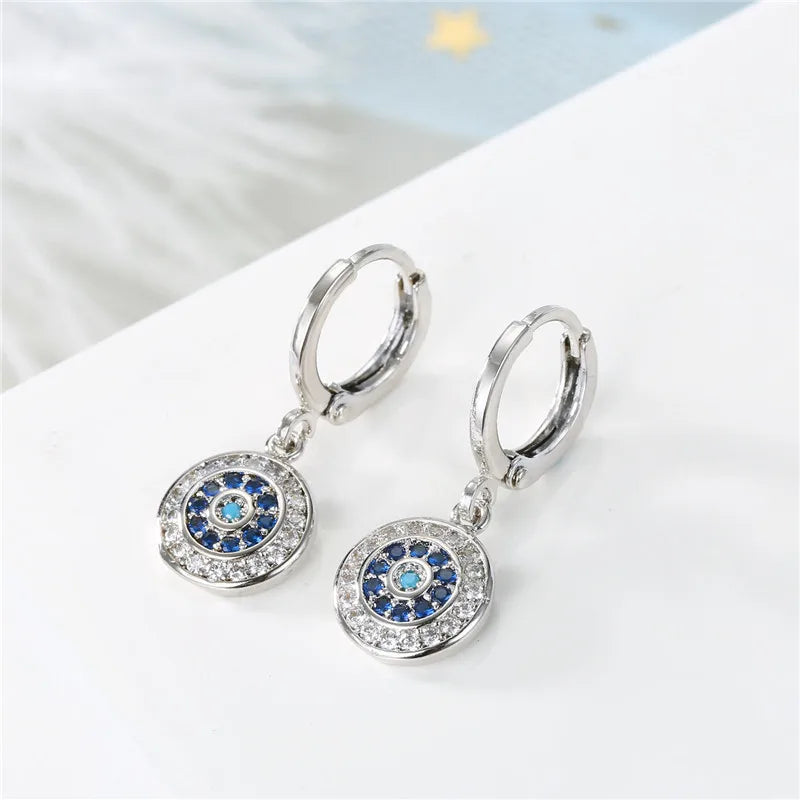 Aretes Ojo Turco Azul con Strass Redondos en Plata