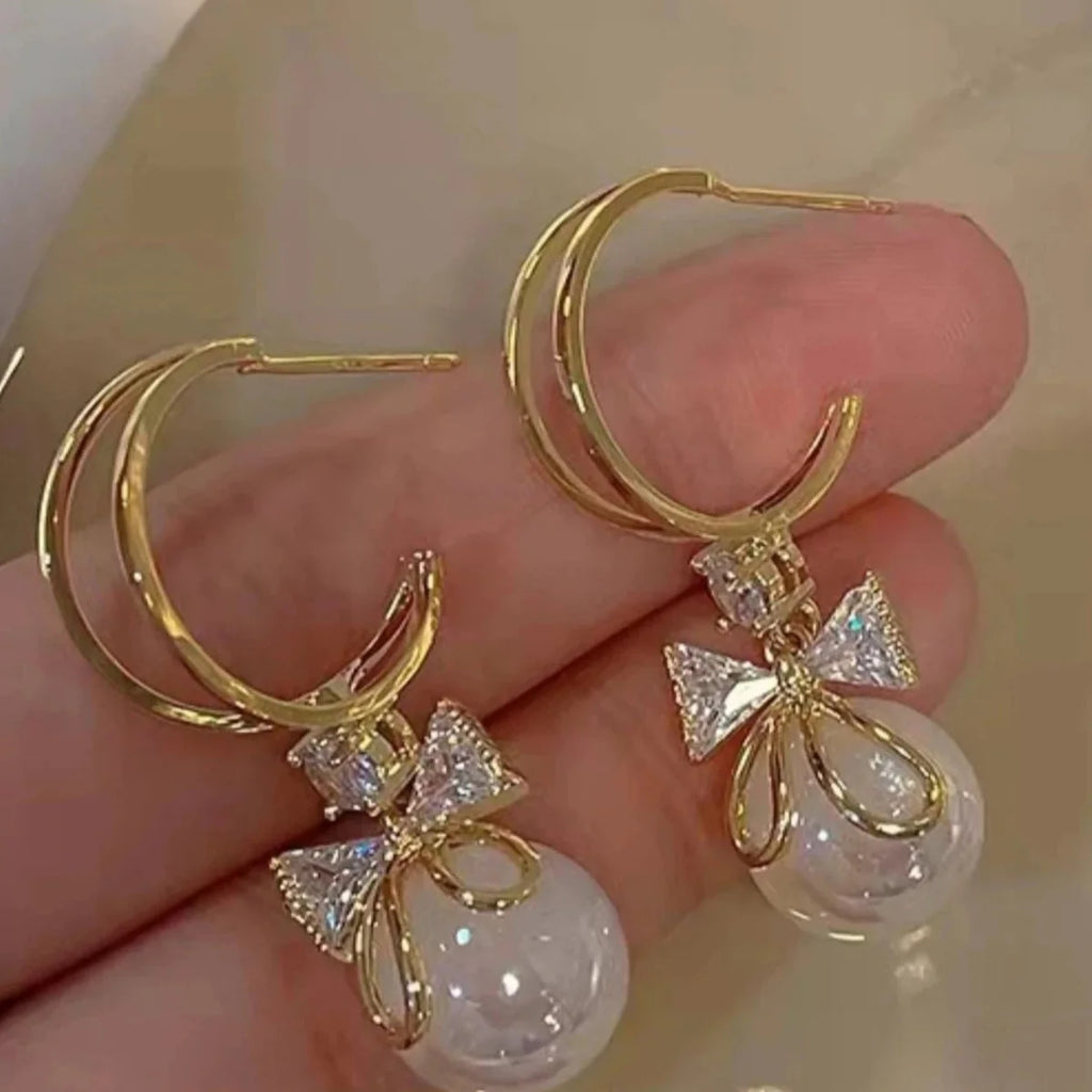 Pendientes Colgantes con Lazo de Mariposa y Perla