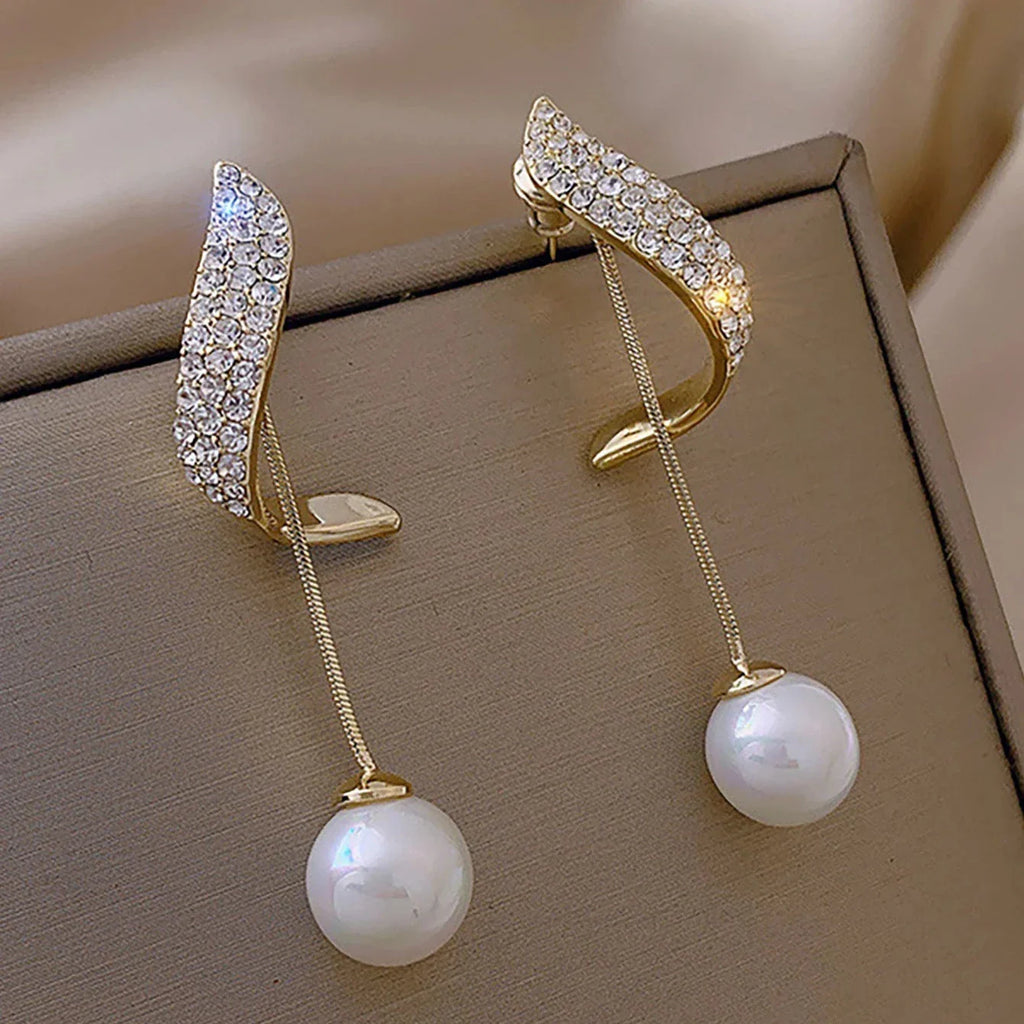Aretes Colgantes con Perlas Blancas 1