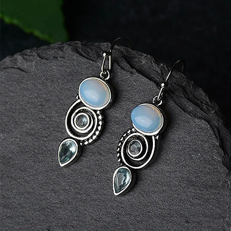 Aretes Colgantes con Zirconia y Piedra de Luna