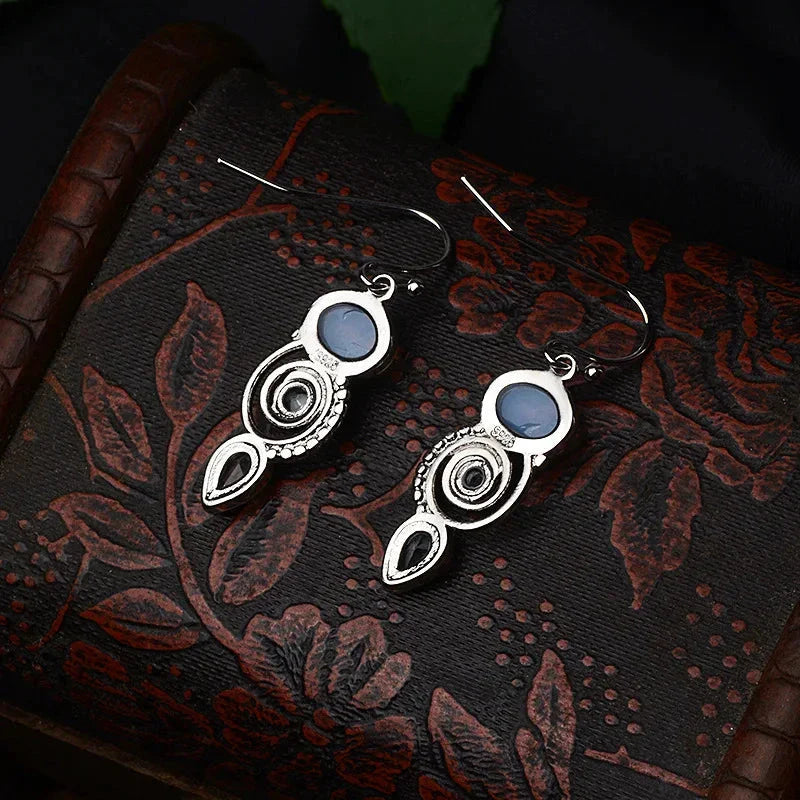 Aretes Colgantes con Zirconia y Piedra de Luna