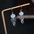 Aretes Colgantes con Zirconia y Piedra de Luna