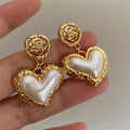 Aretes Colgantes de Corazón para Mujer en Oro