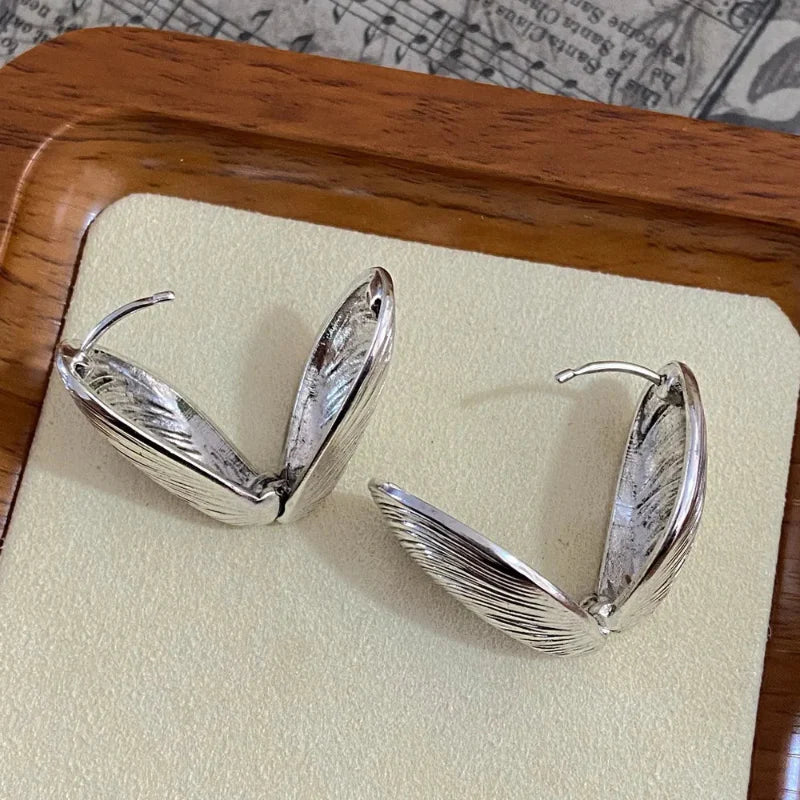 Aretes Colgantes de Conchas y Mejillones en plata