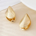 Aretes Colgantes de Conchas y Mejillones en oro