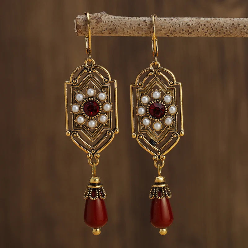Aretes Colgantes Étnicos Asimétricos rojos