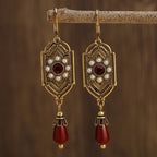 Aretes Colgantes Étnicos Asimétricos rojos