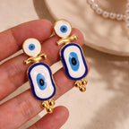 Aretes Colgantes Étnicos Ojo Azul oro
