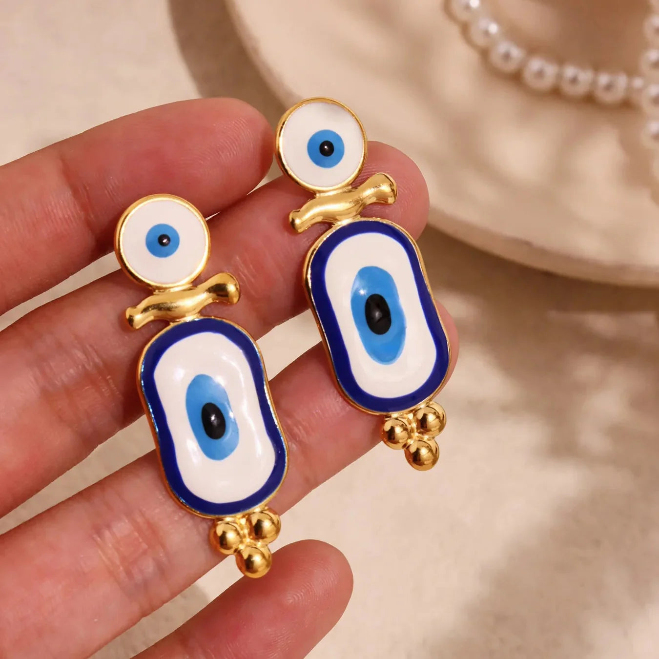 Aretes Colgantes Étnicos Ojo Azul oro