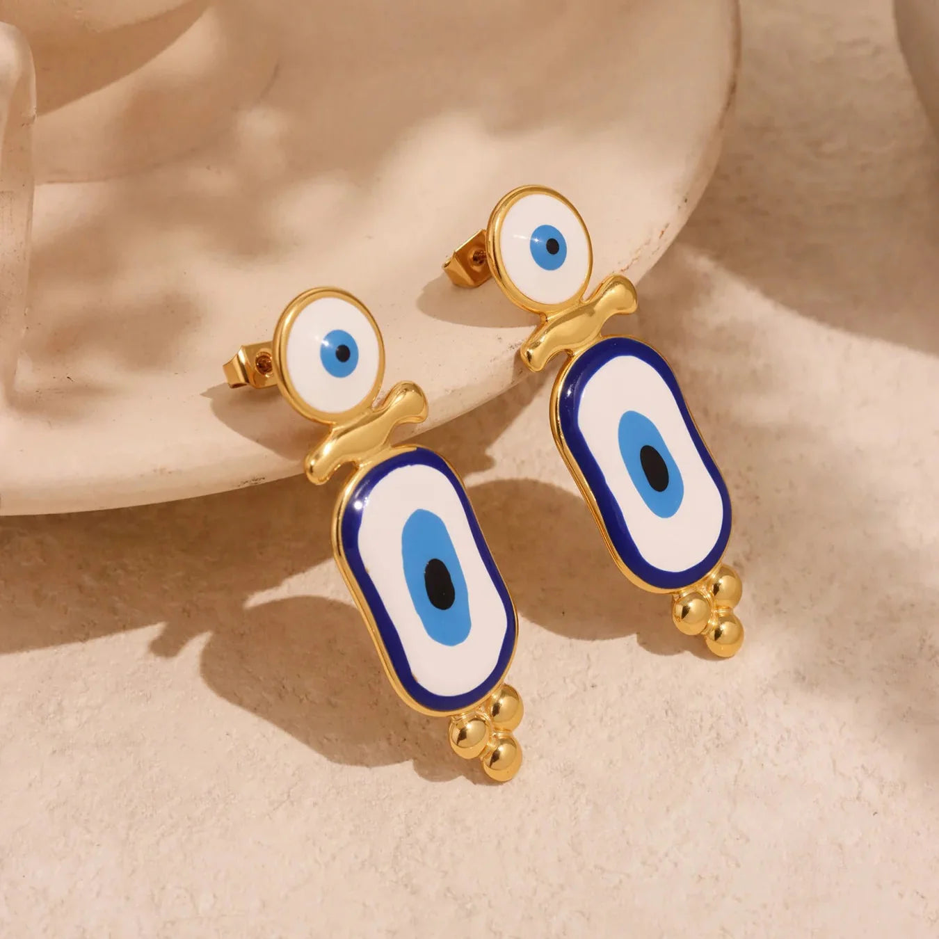 Aretes Colgantes Étnicos Ojo Azul oro