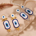 Aretes Colgantes Étnicos Ojo Azul