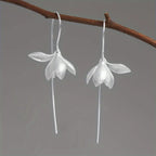 Aretes Colgantes Flor de Magnolia de Plata