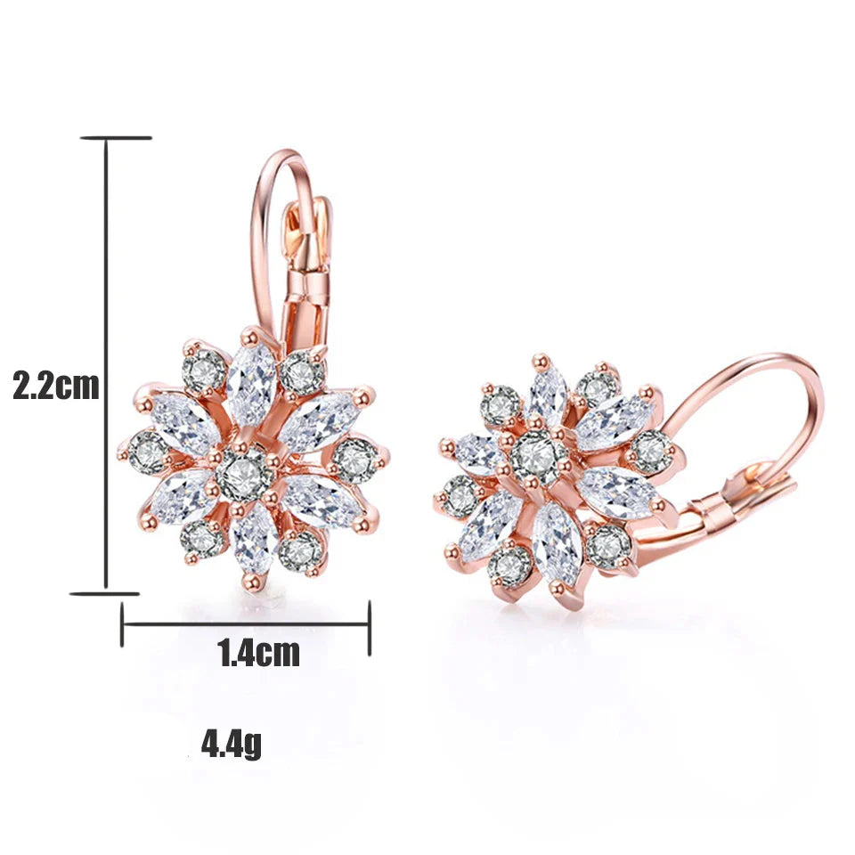 Aretes Colgantes Flor de Circonia oro rosa