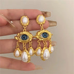 Pendientes Colgantes Ojo Azul y Perlas en oro
