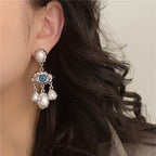 Pendientes Colgantes Ojo Azul y Perlas en plata