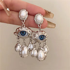 Pendientes Colgantes Ojo Azul y Perlas en plata