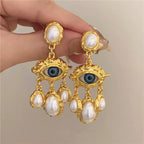 Pendientes Colgantes Ojo Azul y Perlas en oro