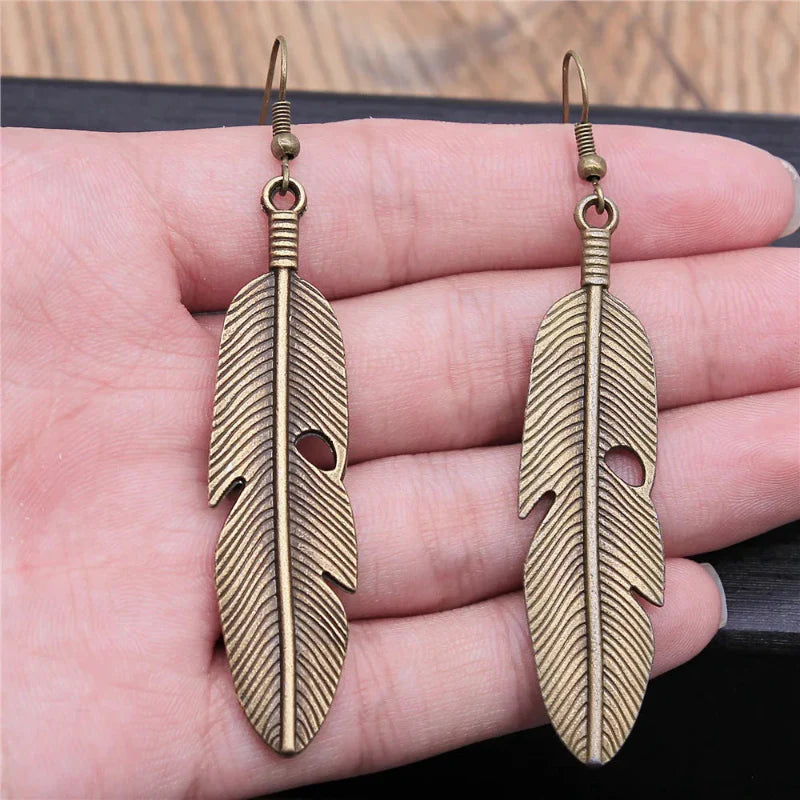 Aretes Colgantes de Plumas para Mujer en bronce