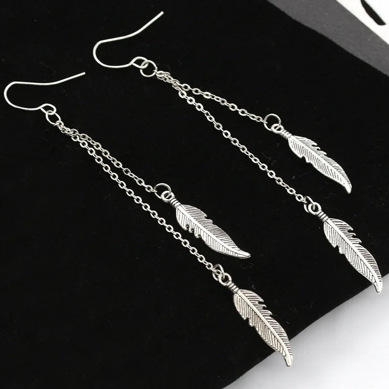 Aretes Colgantes de Plumas en Plata