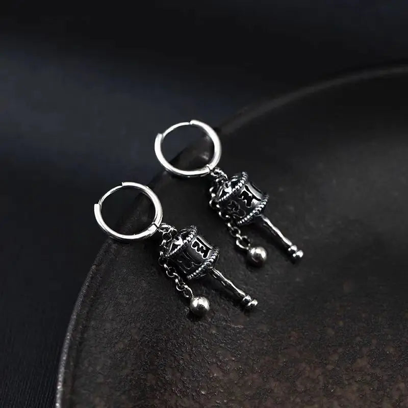 Aretes Colgantes Rueda de Oración Budista