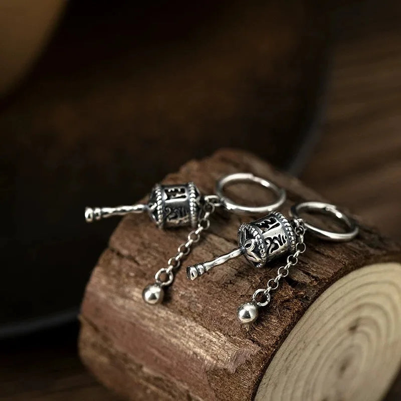 Aretes Colgantes Rueda de Oración Budista