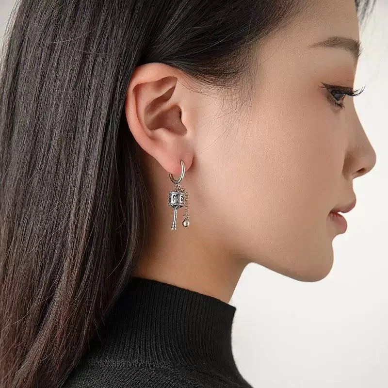 Aretes Colgantes Rueda de Oración Budista