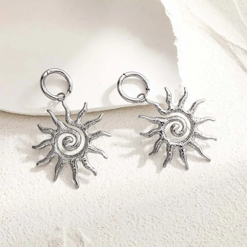 Aretes Colgantes Sol de Plata