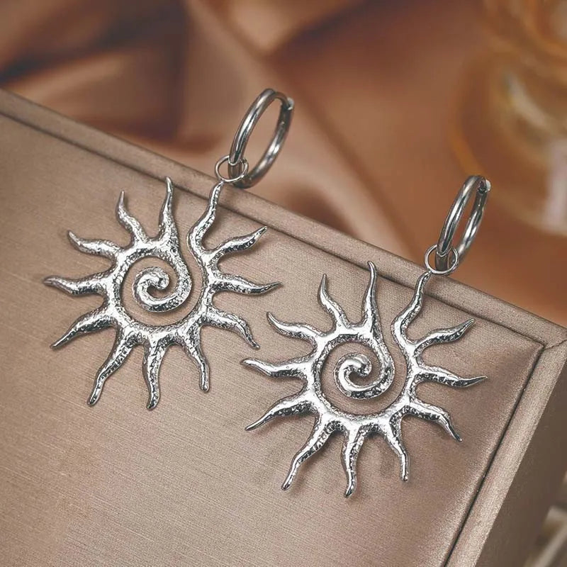 Aretes Colgantes Sol de Plata