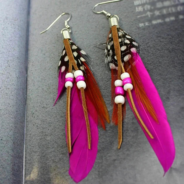 Aretes de plumas estilo Apache fuschia