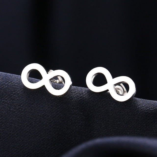 Aretes con Símbolo Infinito en Clavo para Mujer en plata