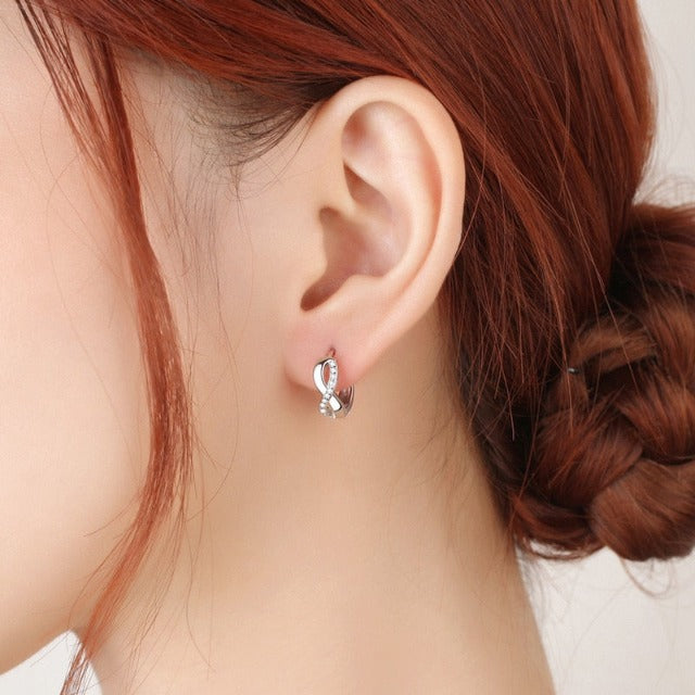 Aretes Símbolo Infinito para Mujer