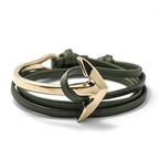 Pulsera ancha ajustable con ancla dorada y verde