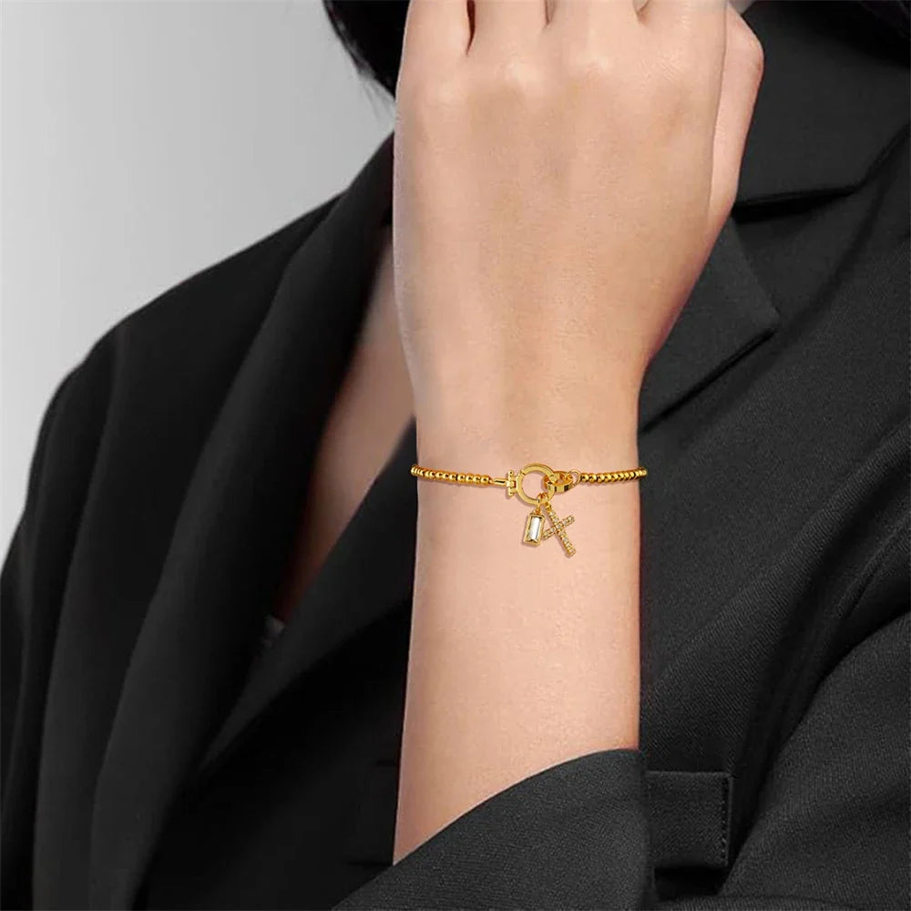 Pulsera con cruz y piedra natal