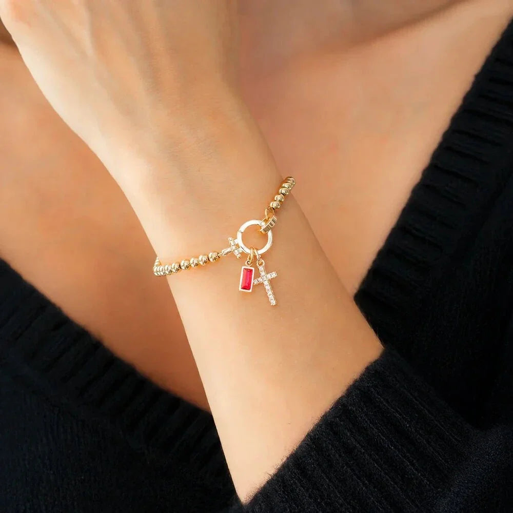 Pulsera con cruz y piedra natal