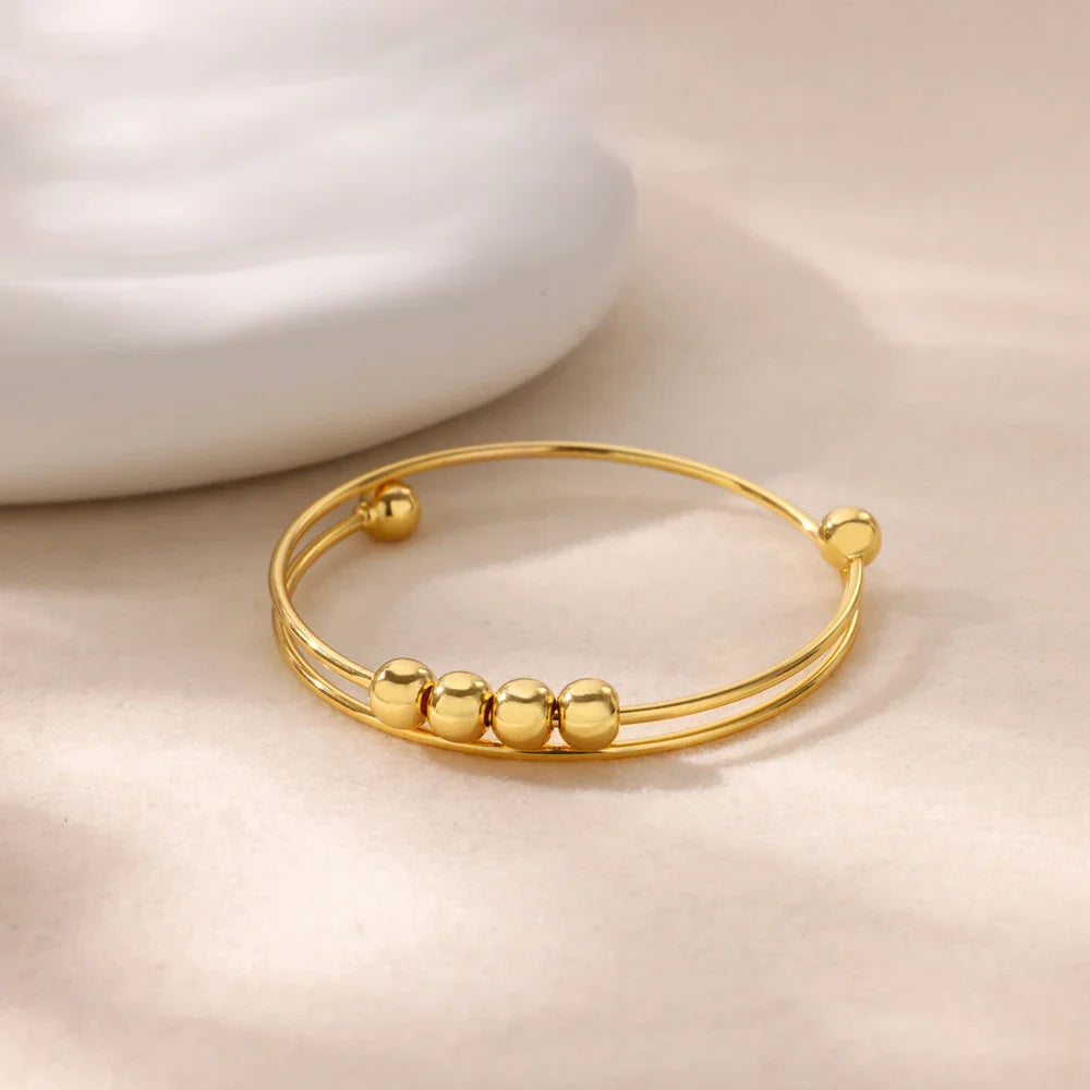 Pulsera con Cuentas Giratorias Antiestrés para Hombre o Mujer oro
