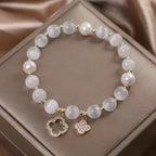 Pulsera de Perlas con Tréboles de 4 Hojas
