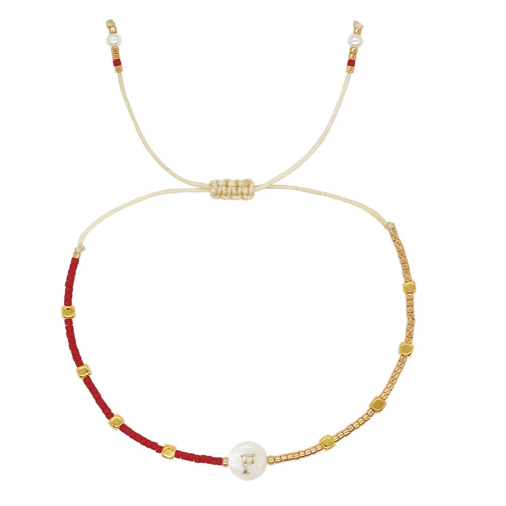 Pulsera bicolor con inicial p