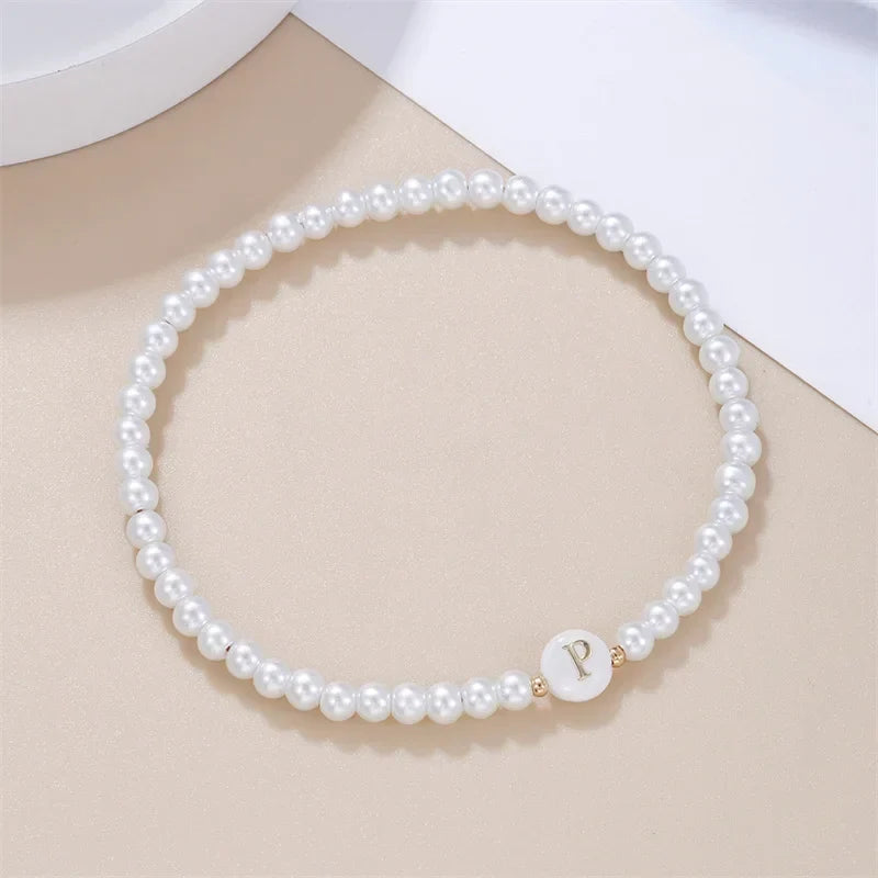 Pulsera blanca inicial p