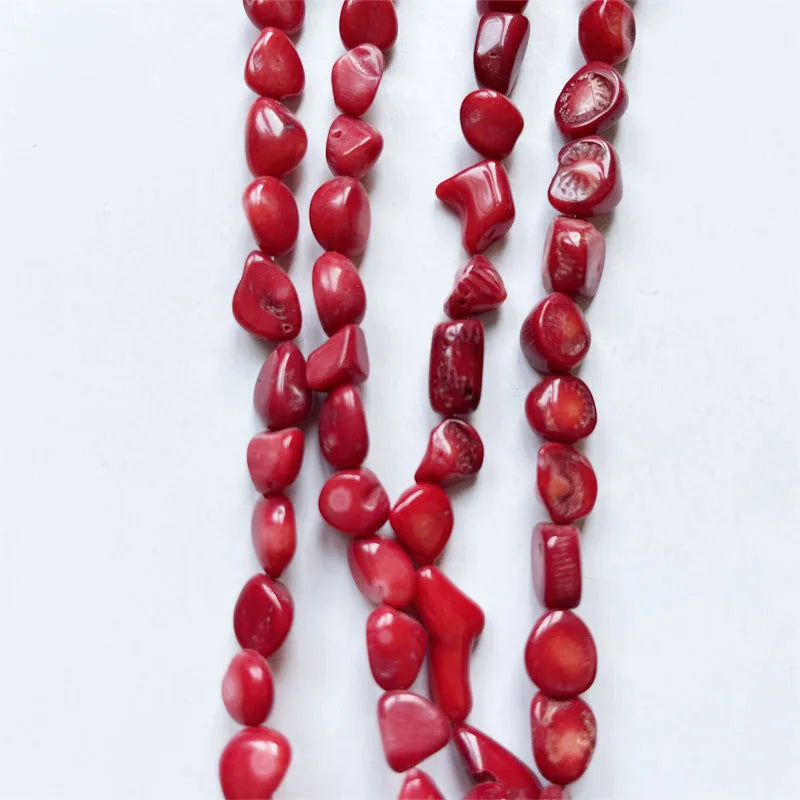 Pulsera de coral rojo en guijarros