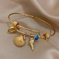 Pulsera de Encanto con Conchas dorada