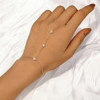 Pulsera de mano con flores de circonio dorado