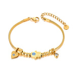 Pulsera de Protección con Mano de Fátima y Ojo Azul en oro