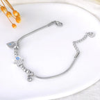 Pulsera de Protección con Mano de Fátima y Ojo Azul en plata