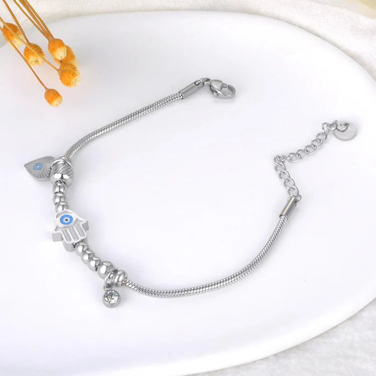 Pulsera de Protección con Mano de Fátima y Ojo Azul en plata