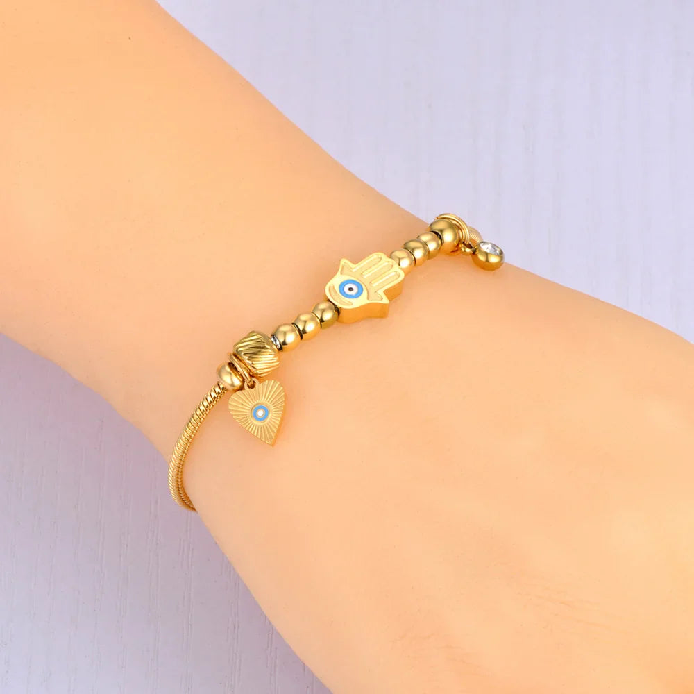Pulsera de Protección con Mano de Fátima y Ojo Azul en oro