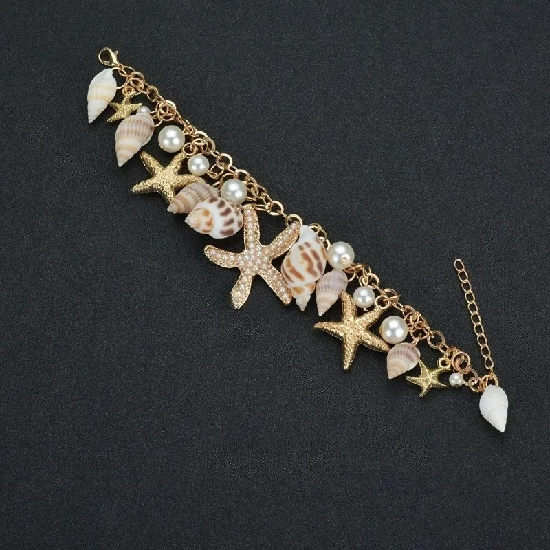 Pulsera Elegante con Conchas oro