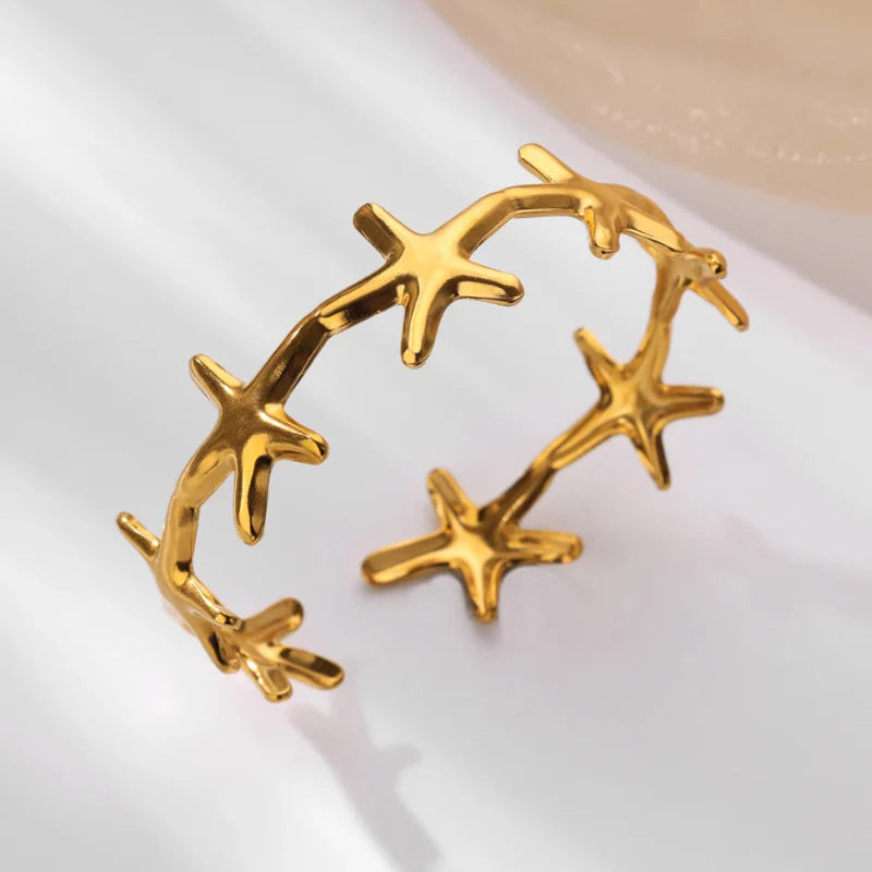 Pulsera Elegante Conchas Estrella de Mar y Vieiras estrella de mar oro