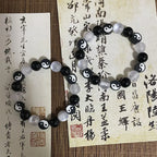 Pulsera de Perlas Yin Yang Negro y Blanco