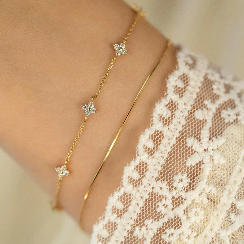 Pulsera Gourmette con Flores Finas en Zirconia dorada